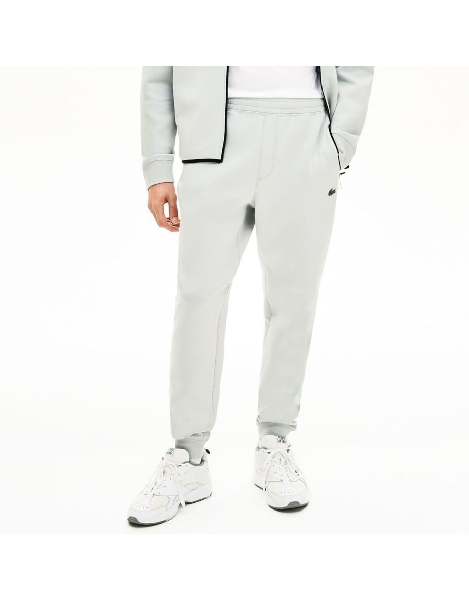 Pantaloni Lacoste Motion Quick-Dry da uomo in grigio