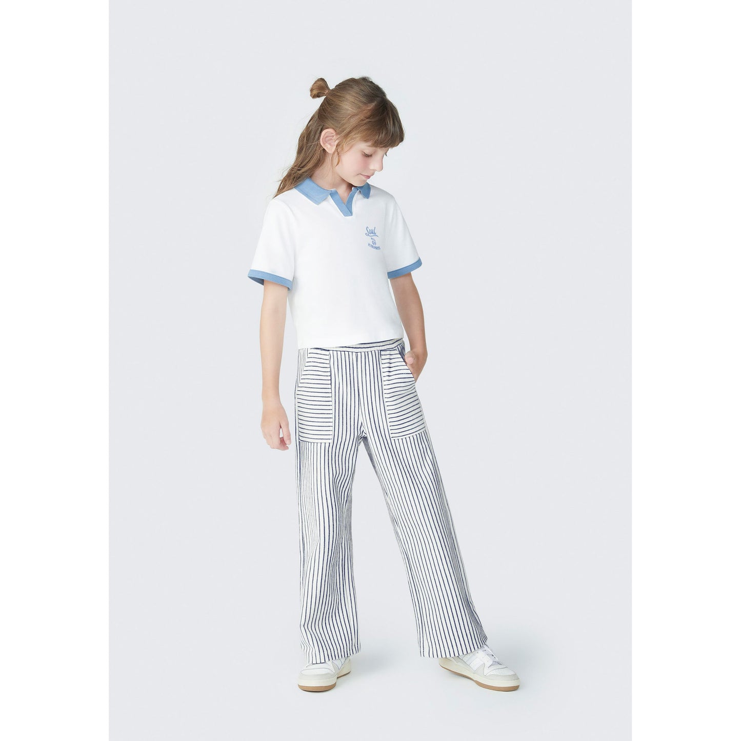 Polo recortado para niña