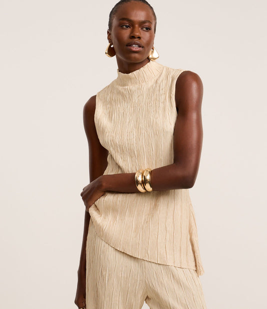 Camicetta beige in jacquard con orlo asimmetrico