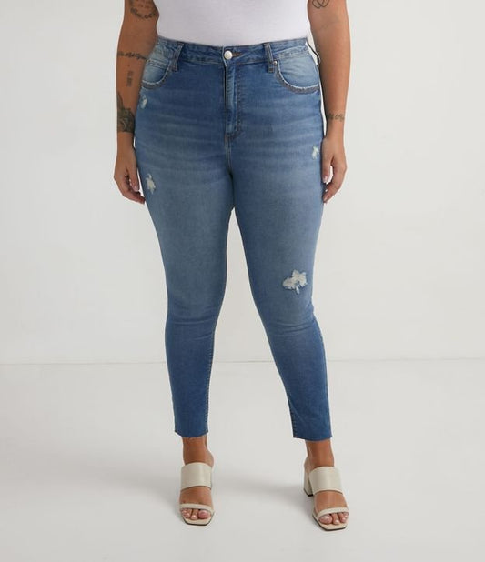 Vaqueros pitillo con detalles desgastados, Curvas y tallas grandes, Azul