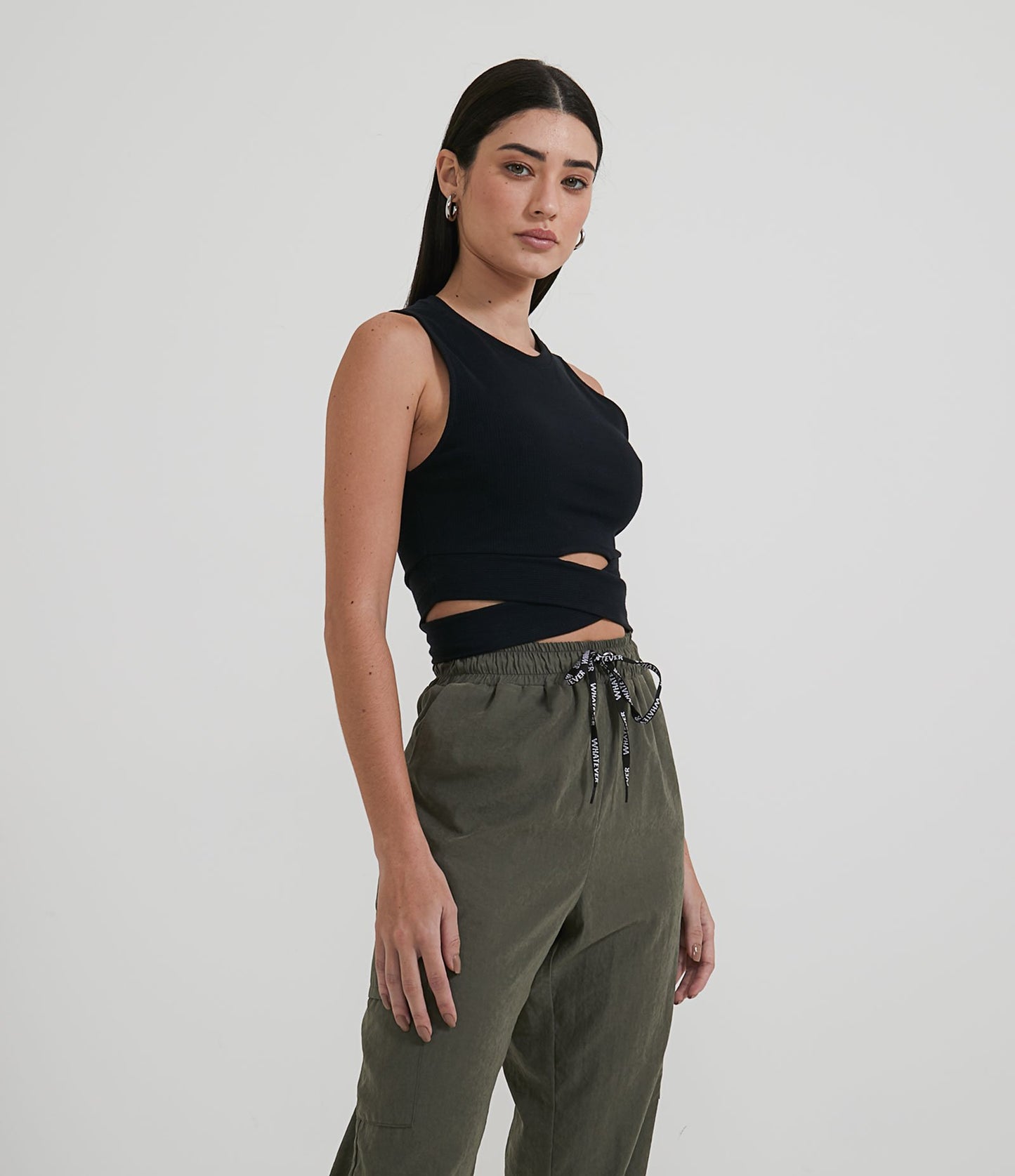 Sleeveless Black Ribbed Cropped Top with Crossed Hem Detail