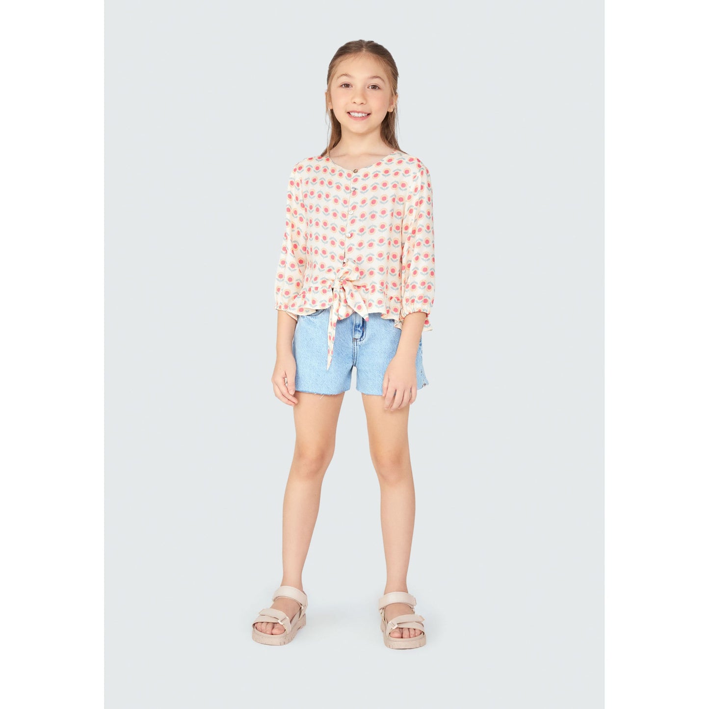 Top a manica lunga da bambina con chiusura a cravatta