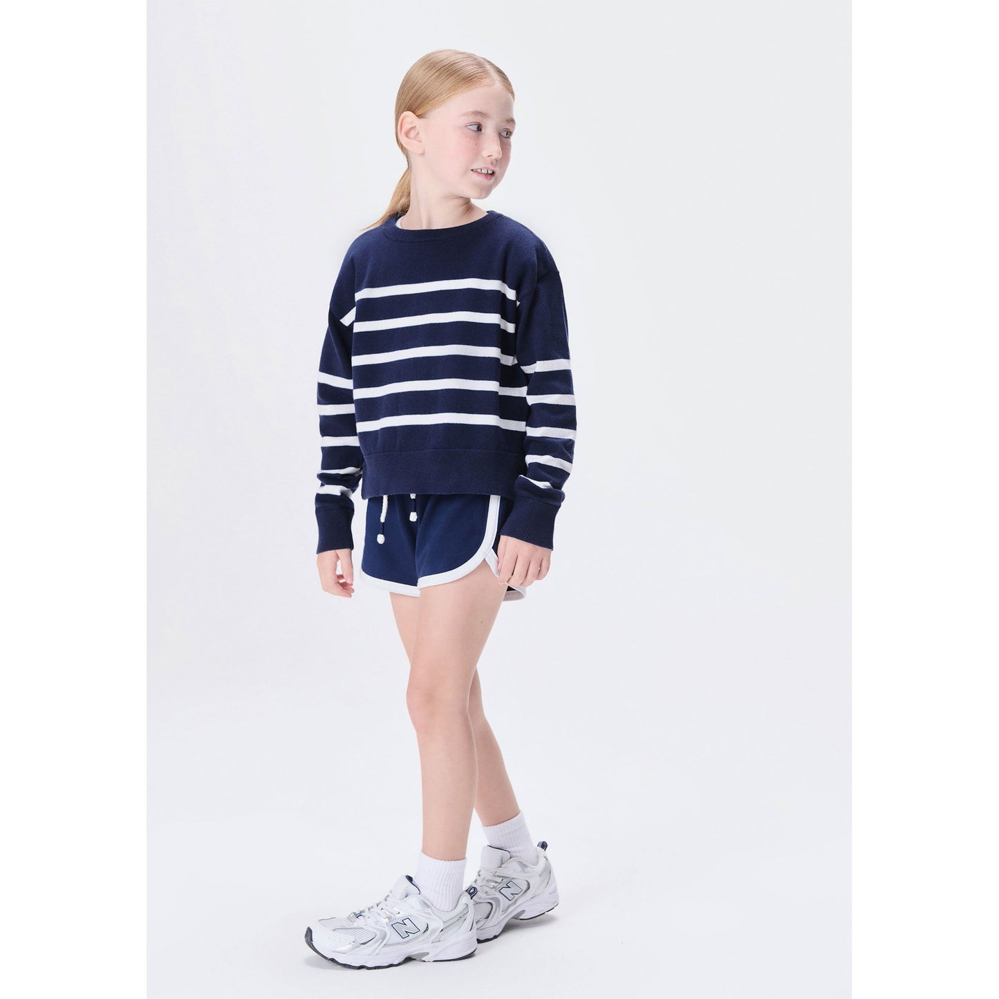 Maglione a righe da bambina