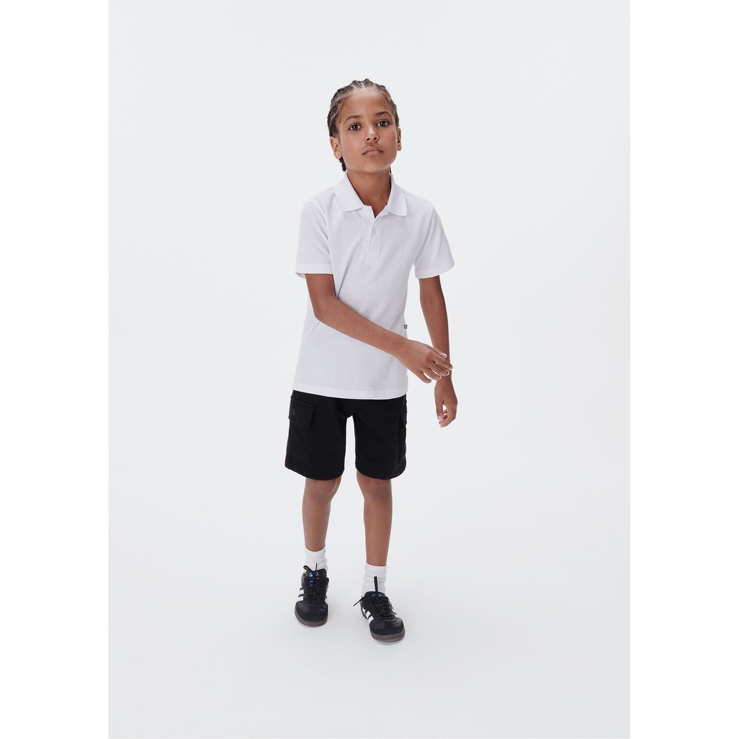 Camisa polo de manga curta em piqué para meninos