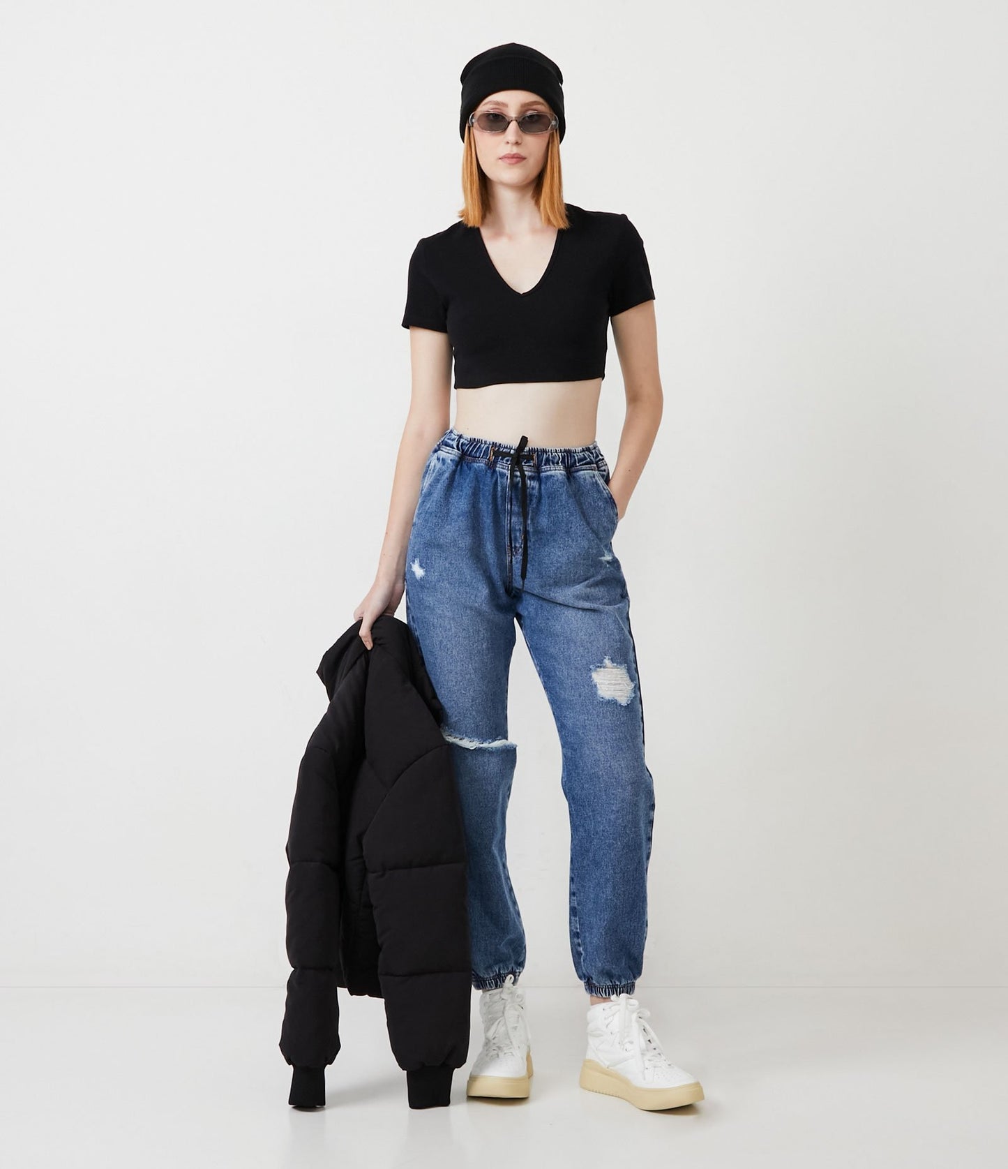 Jeans Jogger con laccetti in vita e dettagli invecchiati in blu