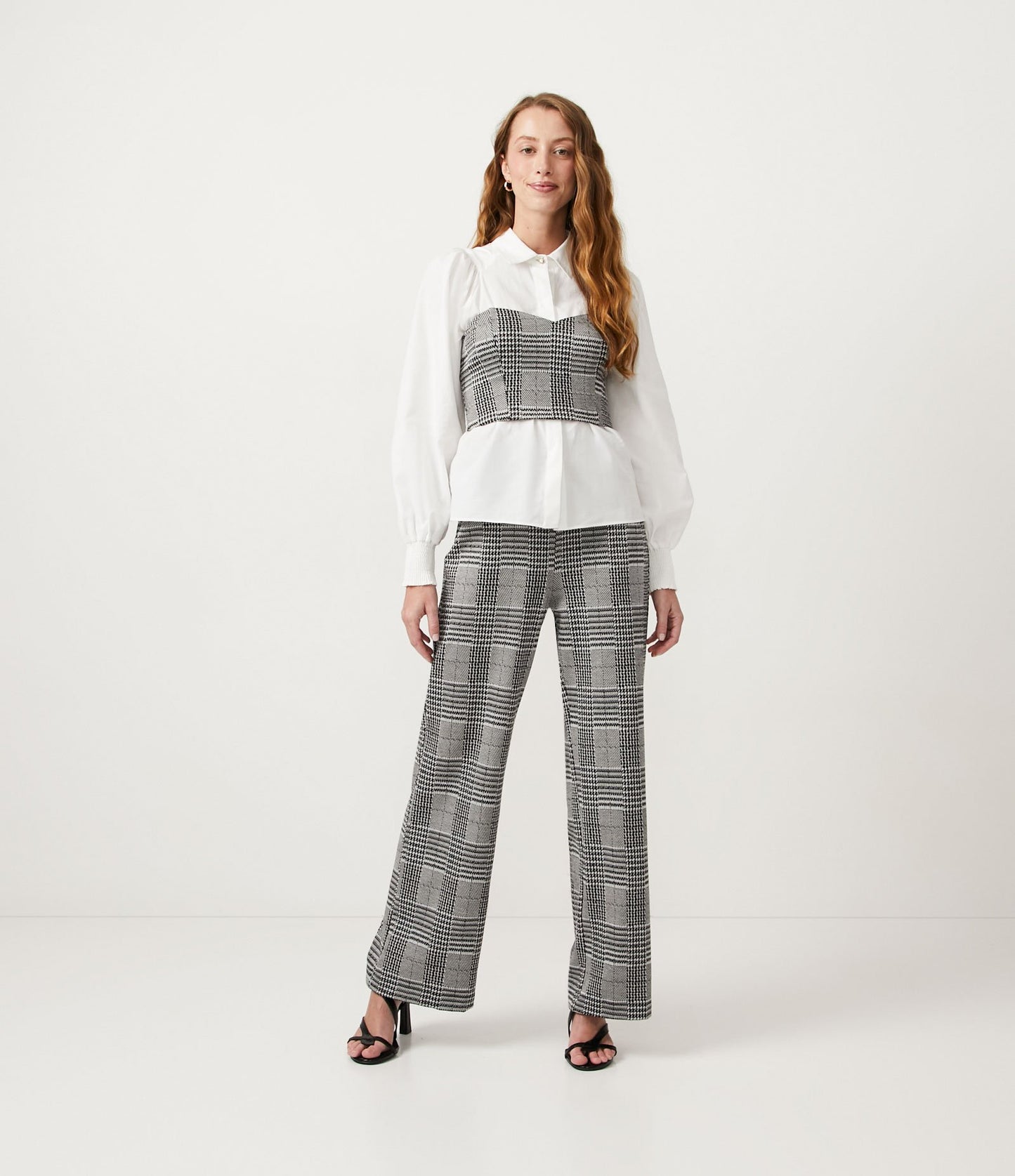 Pantaloni a gamba dritta in maglia di tweed con stampa a quadri neri