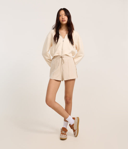 Pantaloncini dal taglio regolare con elastico in vita e coulisse beige bicolore