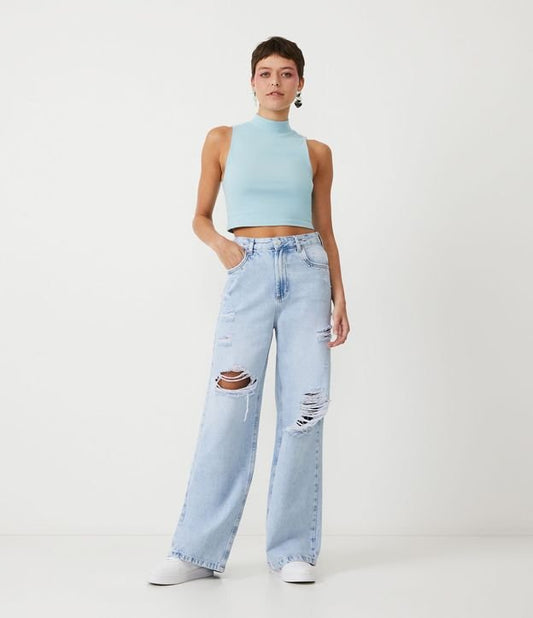 Jeans a gamba larga con cintura borchiata e finitura blu anticato