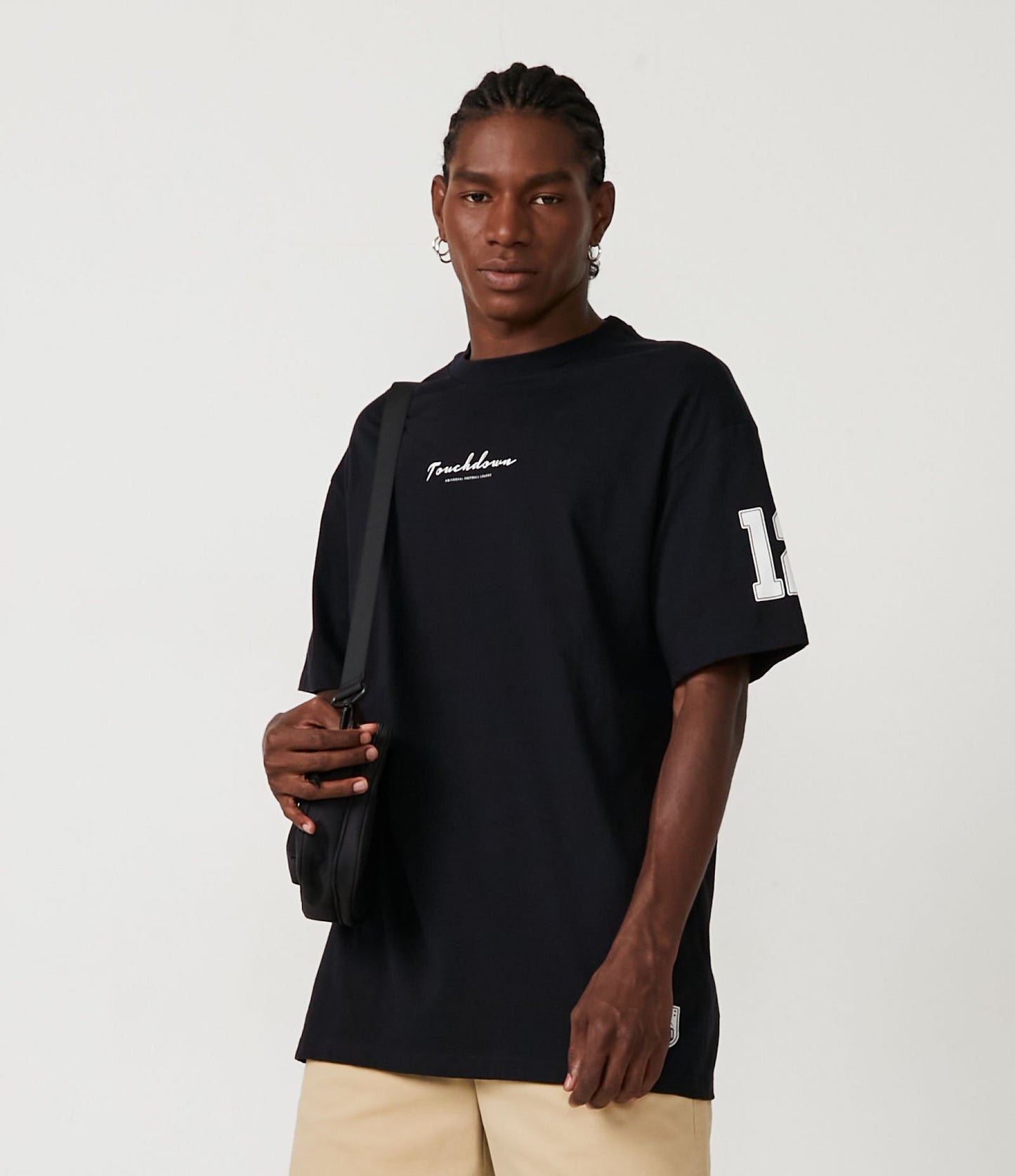 Camiseta relaxed fit de punto negro con estampado Touchdown