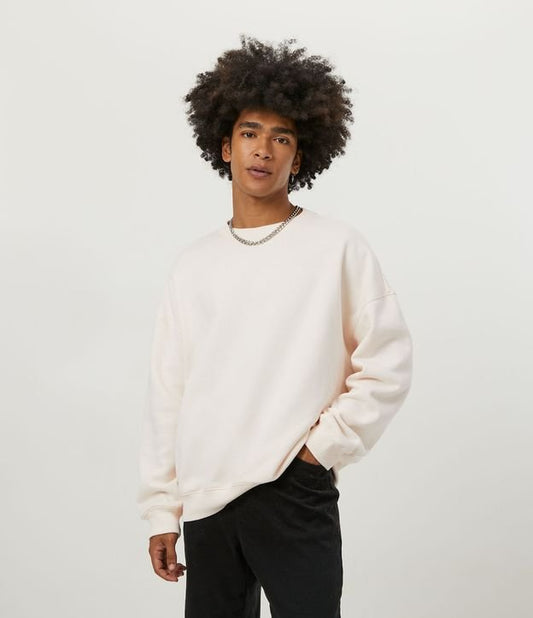 Sudadera rosa con hombros caídos y mangas largas ajustadas