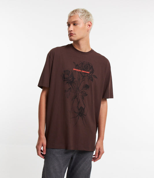 Camiseta relaxada de algodão com estampa de rosas e letras marrons