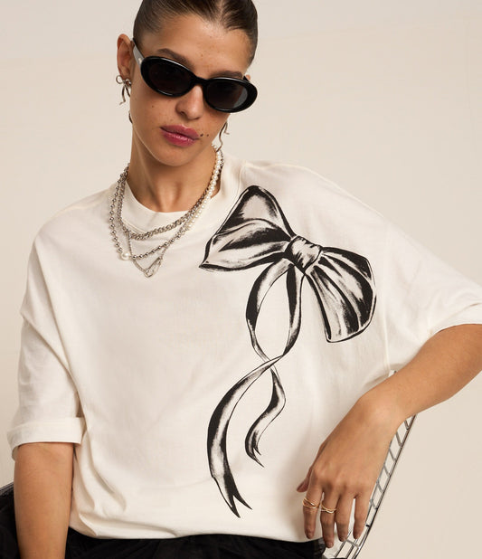 Camiseta oversize de algodón con estampado de lazos blancos