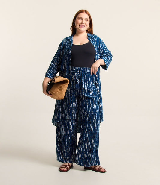 Pantalones azules de pernera ancha con estampado de minitriángulos - Tallas grandes y curvas