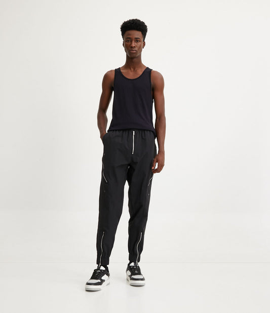 Pantaloni Jogger in poliammide nera con elastico in vita e cerniere