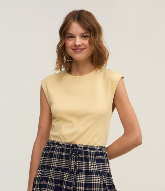 Blusa amarilla de algodón sin mangas con pliegues