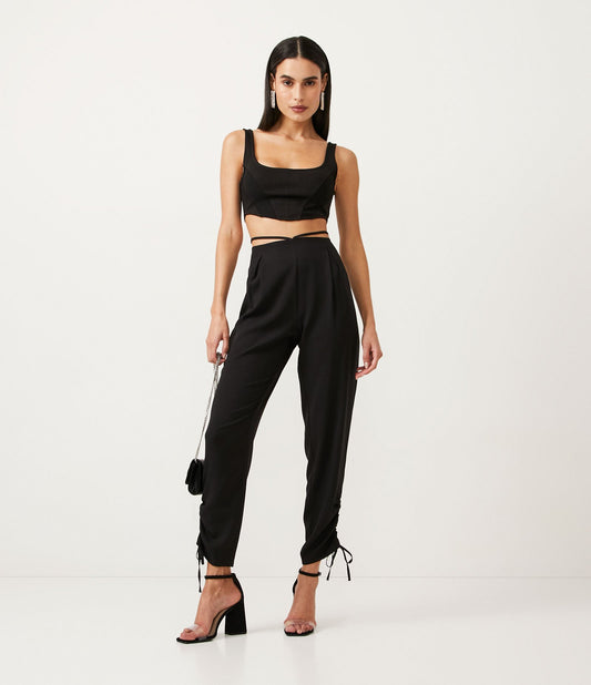 Calça Jogger de crepe preta com tiras na cintura e bainha com laço ruched