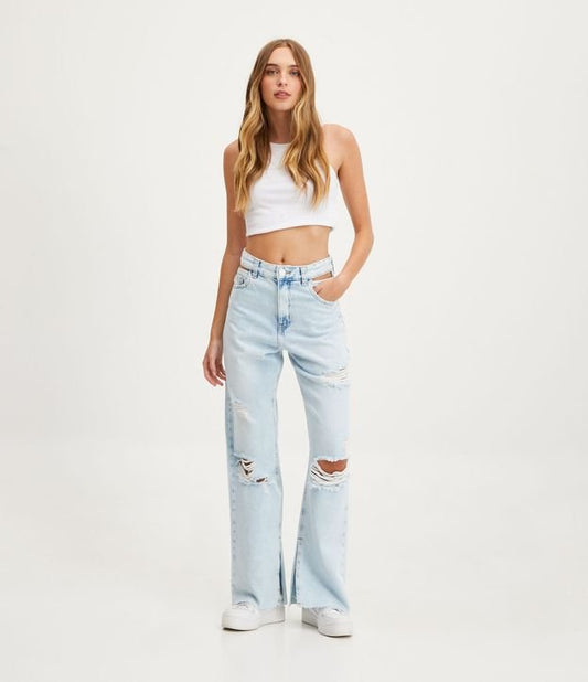 Jeans stile anni '90 con cintura blu e etichetta estiva