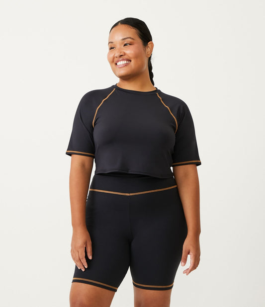 Top esportivo cropped preto Curve & Plus Size em poliamida com acabamento contrastante