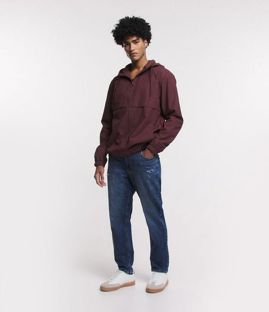 Jeans cropped slim con dettagli e tasche distressed in blu