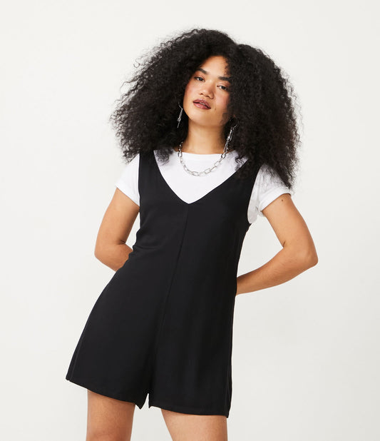 Romper in viscosa nera con tasche laterali