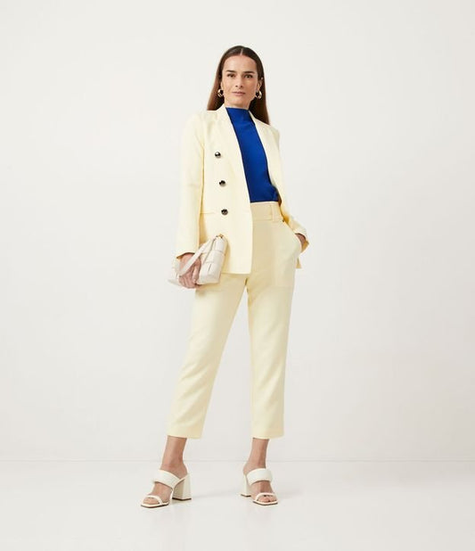 Pantaloni sartoriali a sigaretta gialli con bottoni unici