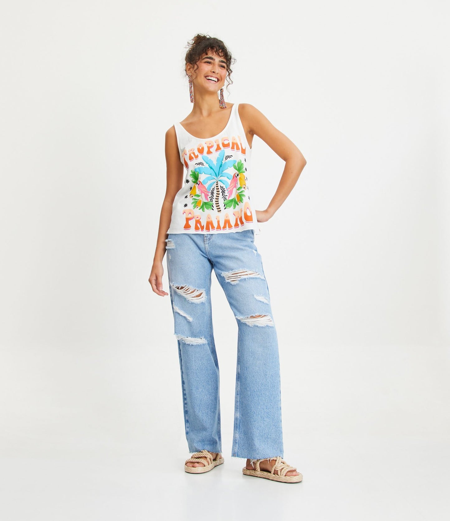 Jeans blu strappati stile anni '90