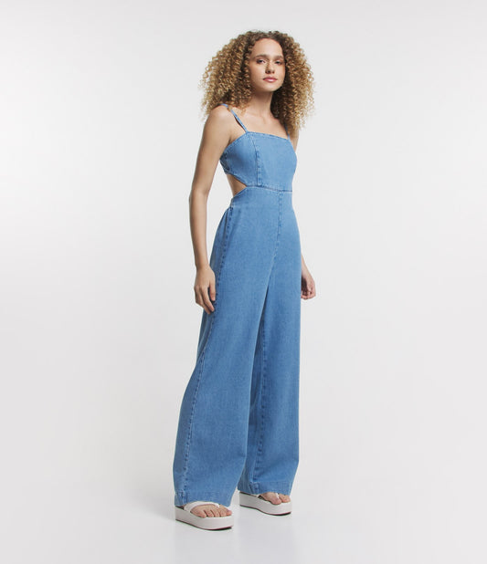 Tuta lunga in denim con ritaglio laterale e laccetto posteriore in blu medio