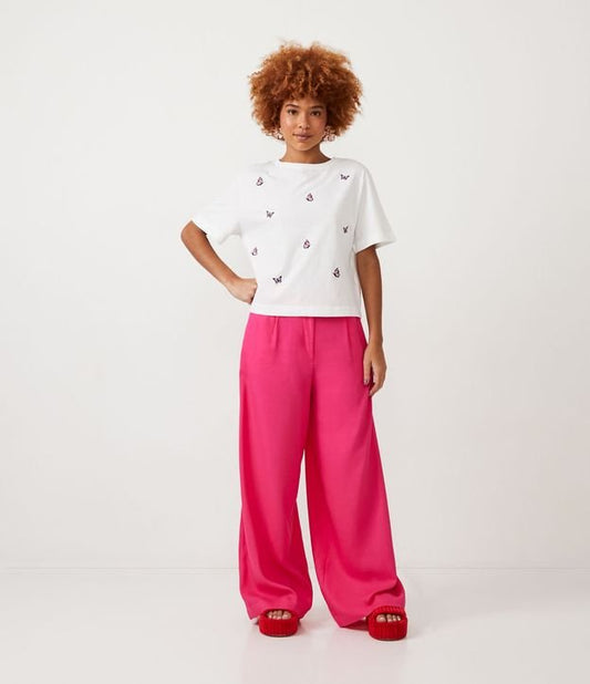 Calça de linho rosa de perna larga com bolsos e pregas