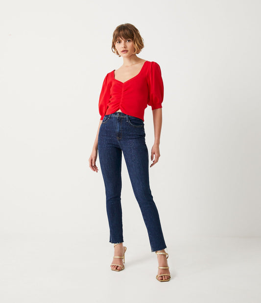 Jeans skinny con brillantini applicati in blu