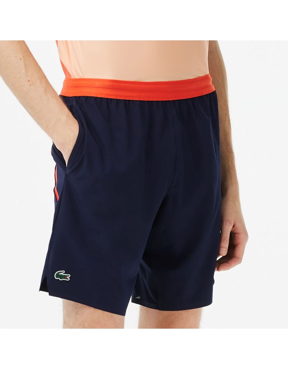 Pantaloncini Lacoste Tennis Taffeta da uomo in blu - Collezione Novak Djokovic