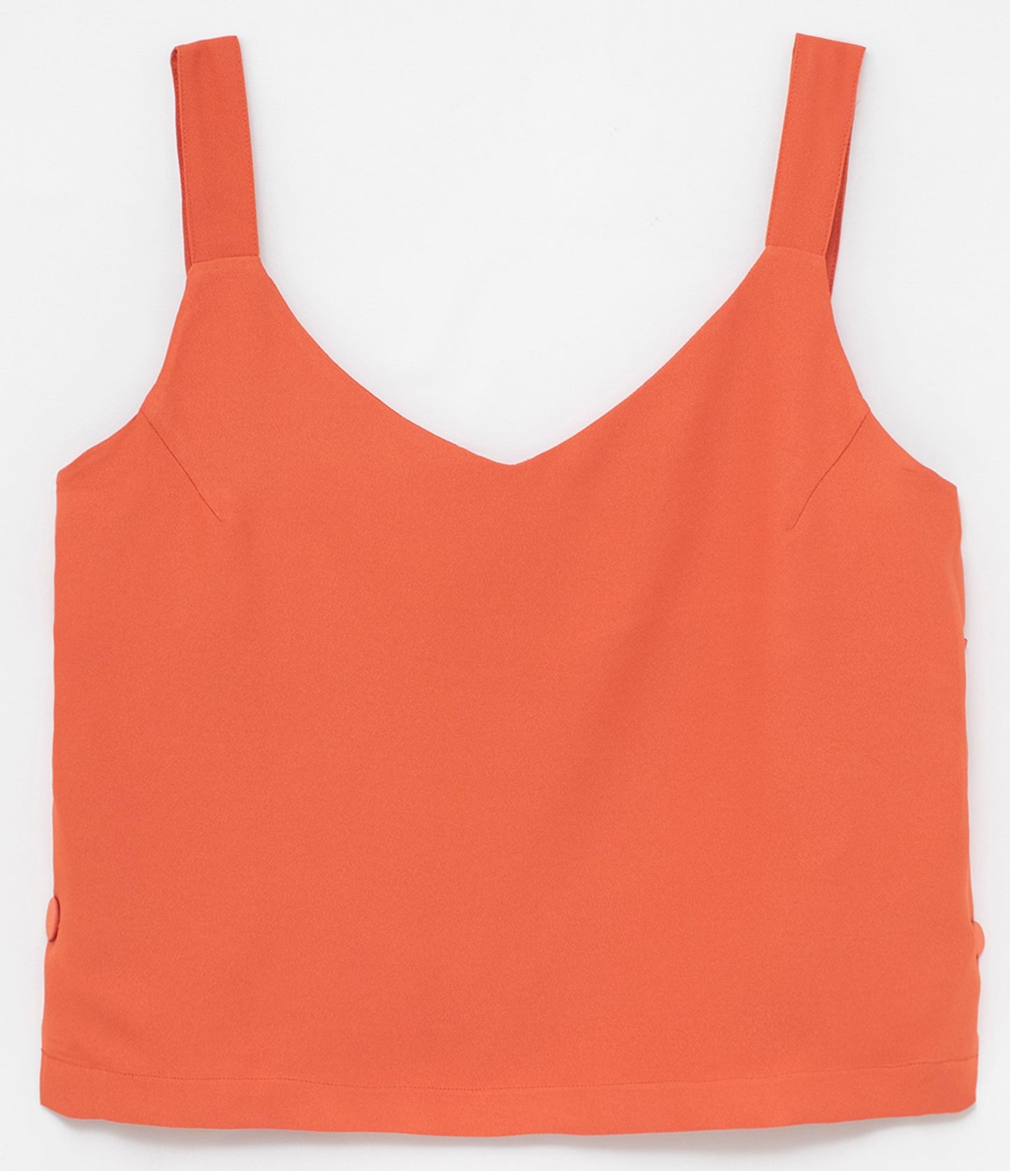Top naranja sin mangas con botones laterales