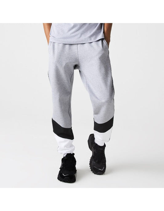 Joggers Lacoste da uomo con nastro laterale in grigio