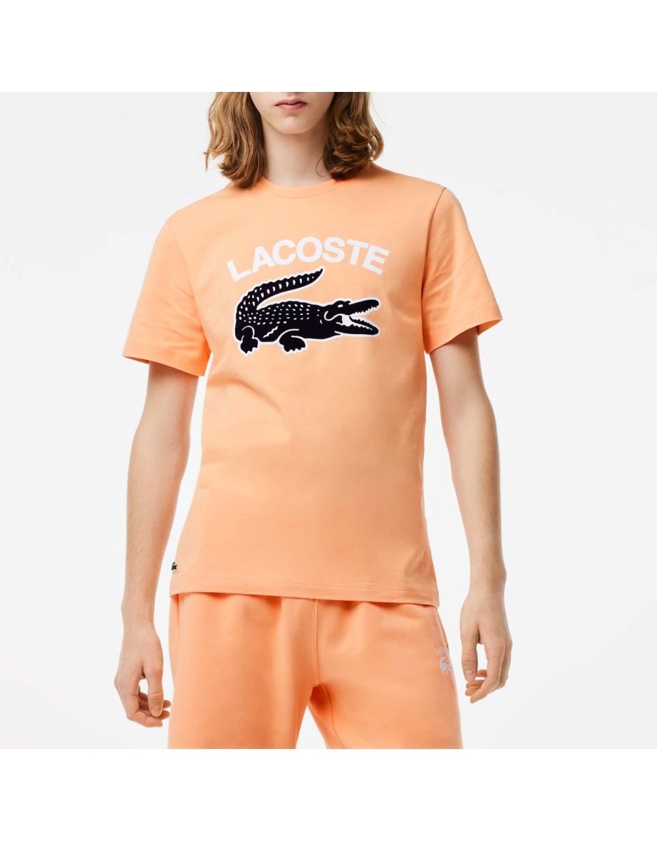 Camiseta masculina Lacoste com estampa de crocodilo laranja