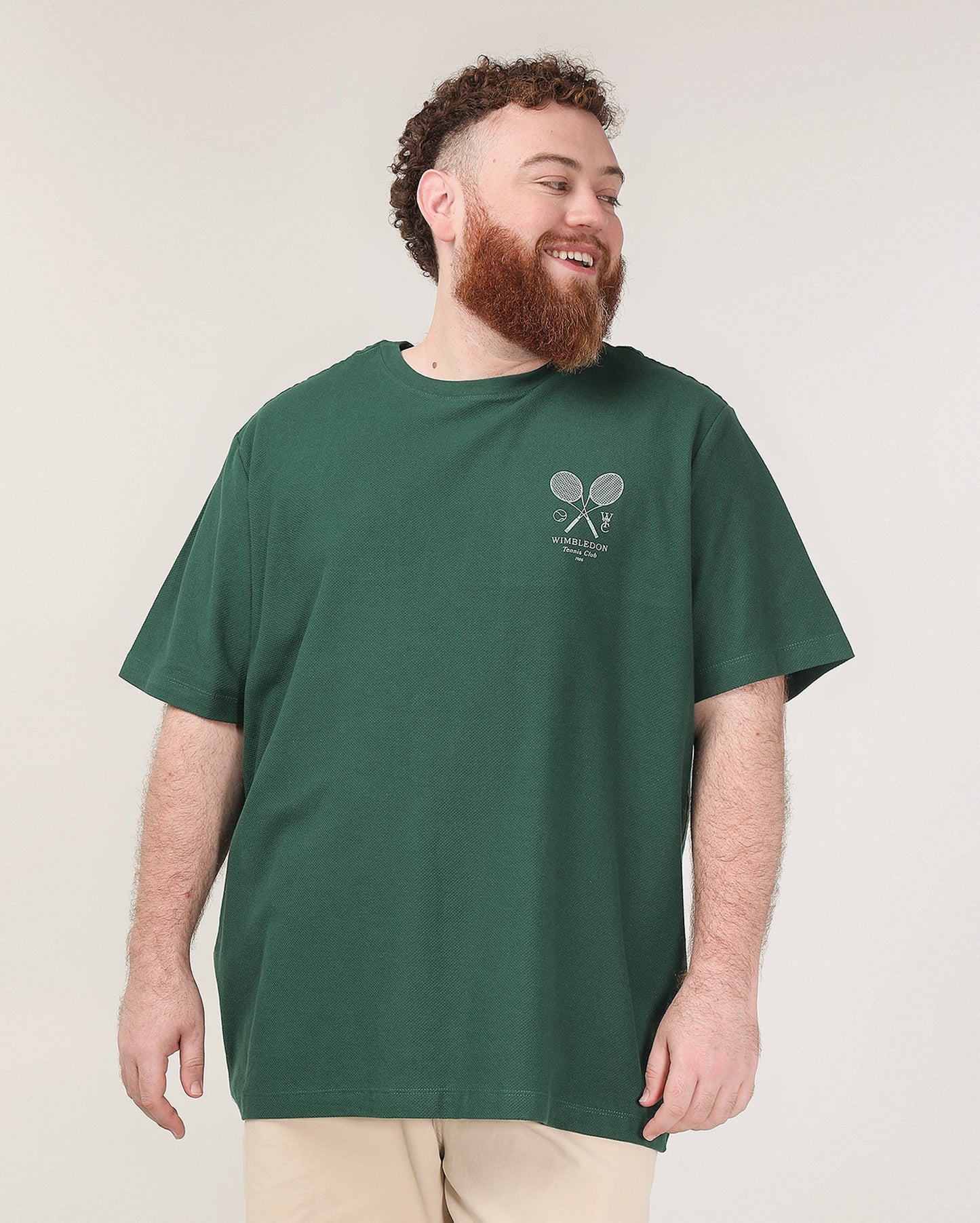 Camiseta masculina plus size verde com tênis Piquet | Original Plus da Riachuelo