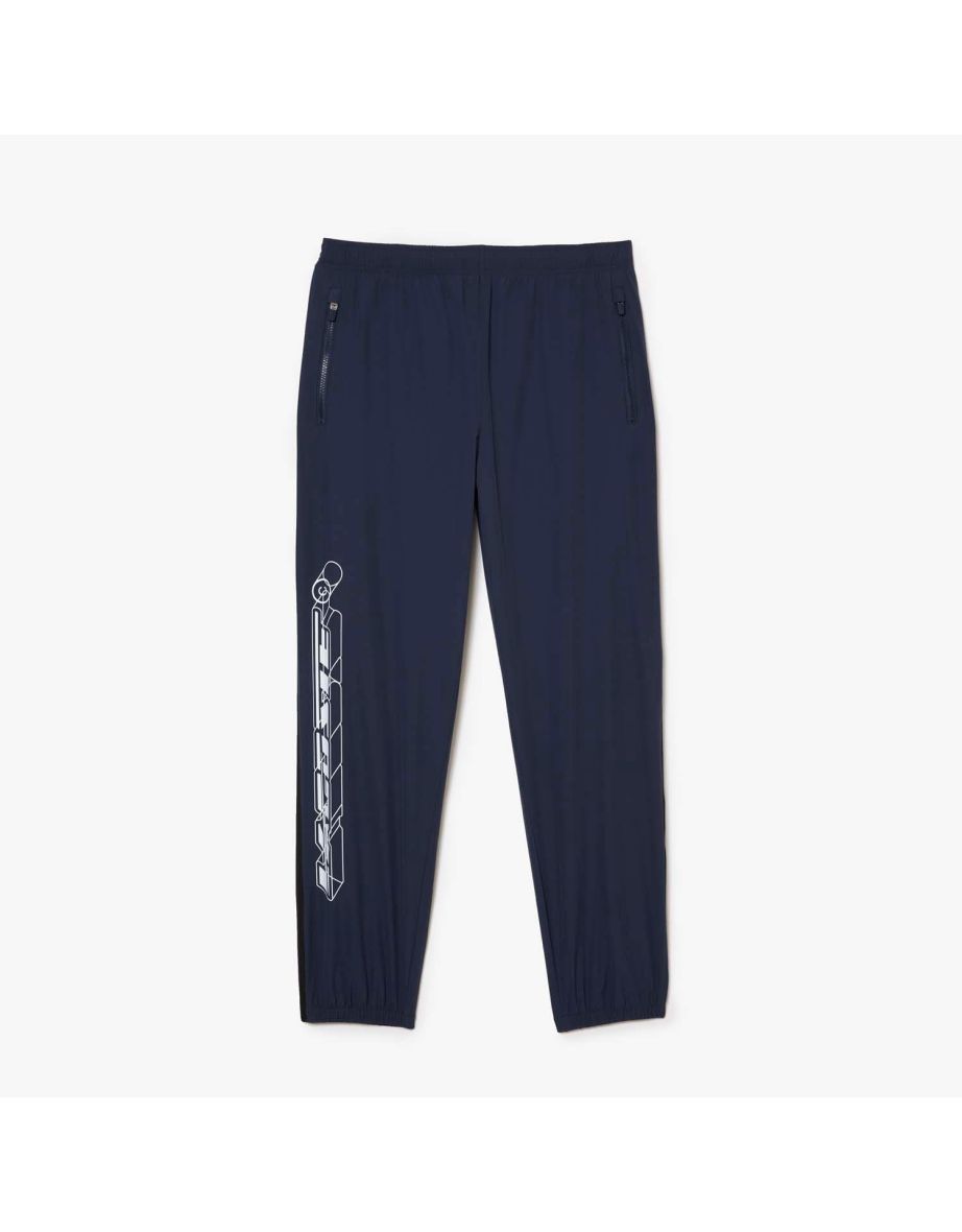 Pantaloni da corsa Lacoste Stretch resistenti all'acqua da uomo in blu