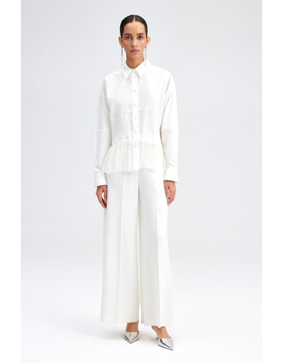 Camicia con orlo in pizzo e dettagli