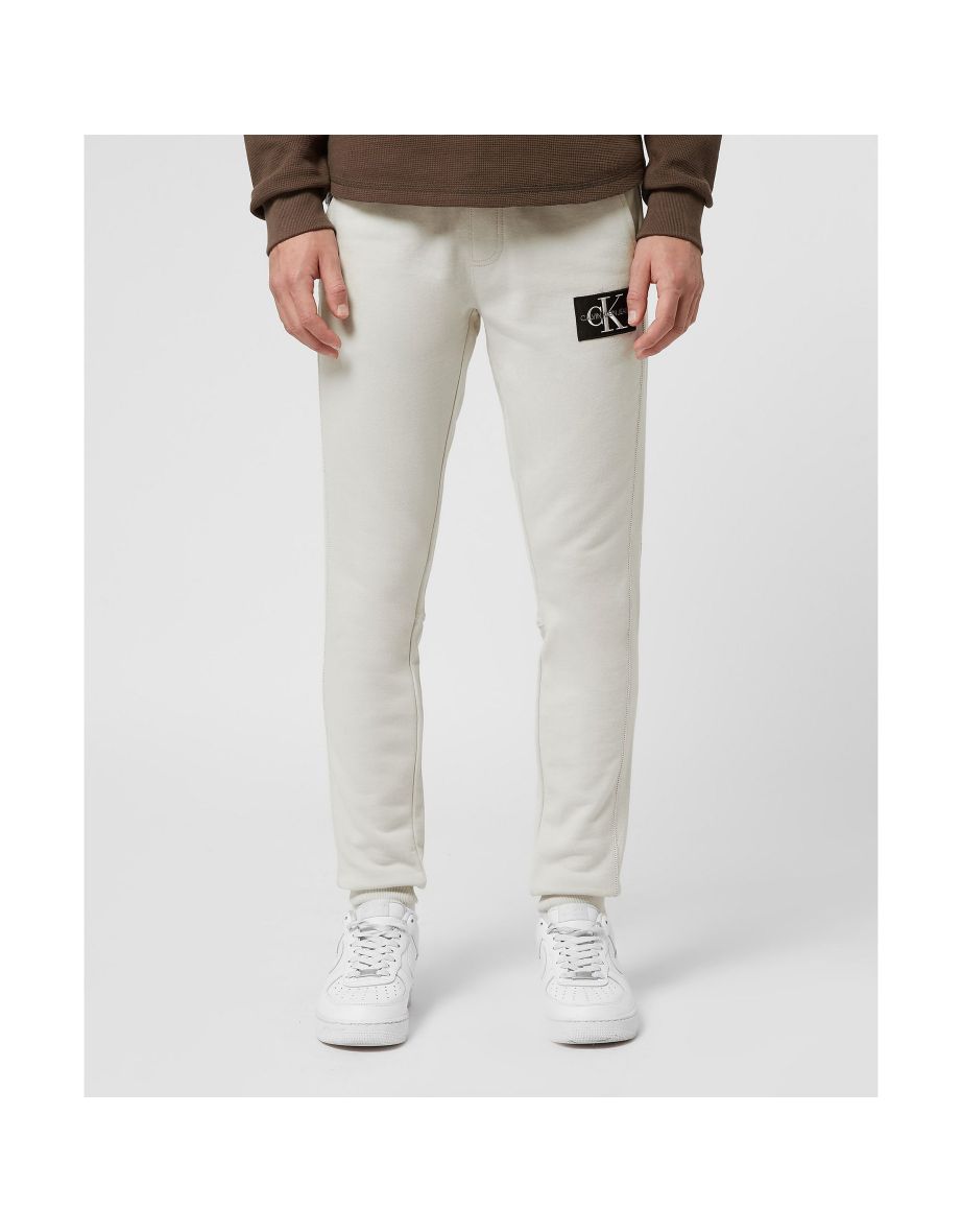 Joggers Calvin Klein Monogram Badge da uomo in grigio