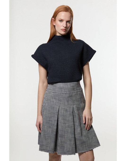 Gonna intera sartoriale in tweed primaverile