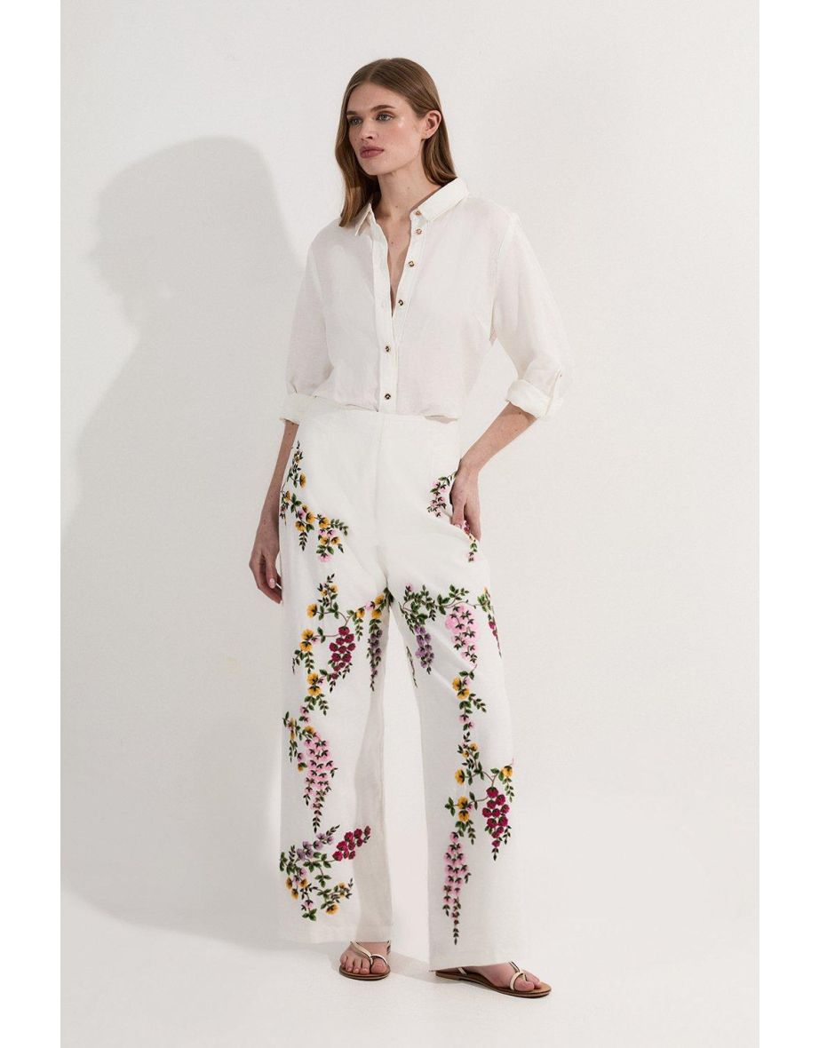 Pantaloni alti in tessuto con ricamo floreale
