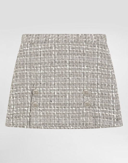 Gonna in bouclé lamé con bottoni decorativi