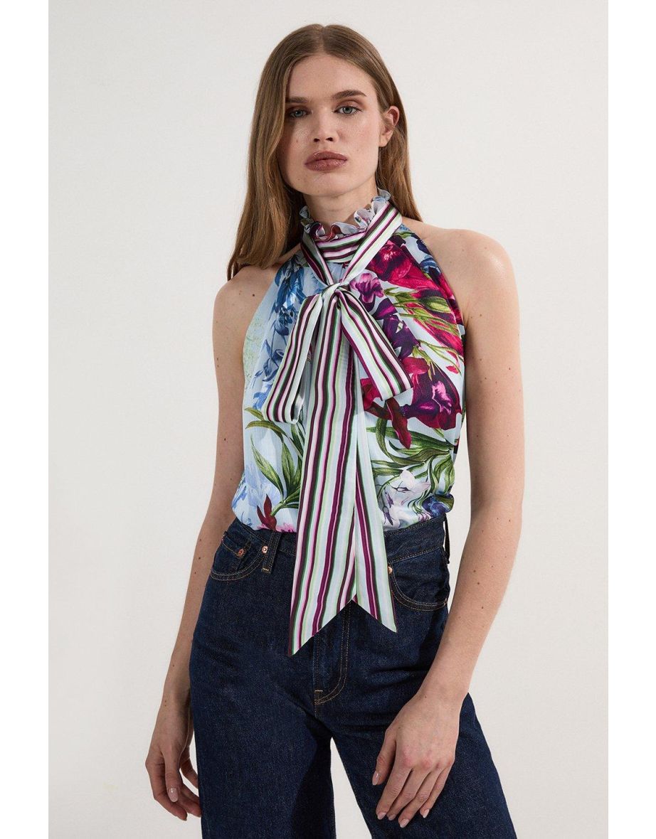 Camicetta con stampa floreale e scollo a farfalla