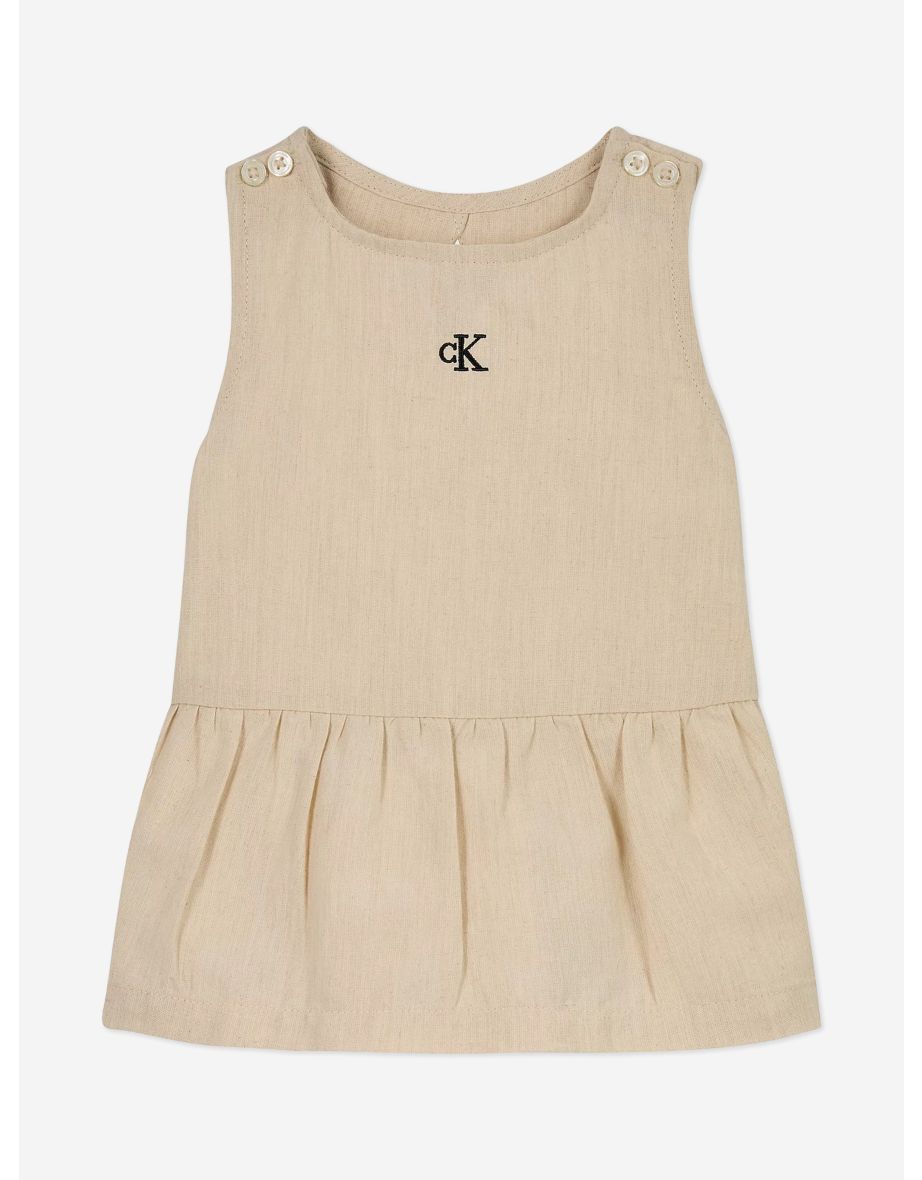 Vestito da bambina beige in tessuto misto lino