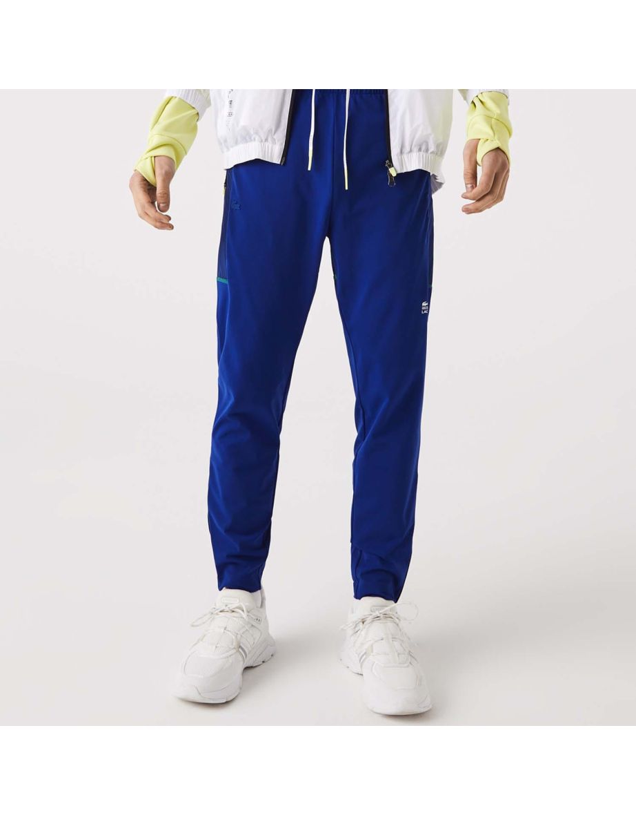 Pantaloni della tuta Lacoste Sport conici da uomo con tasche con zip