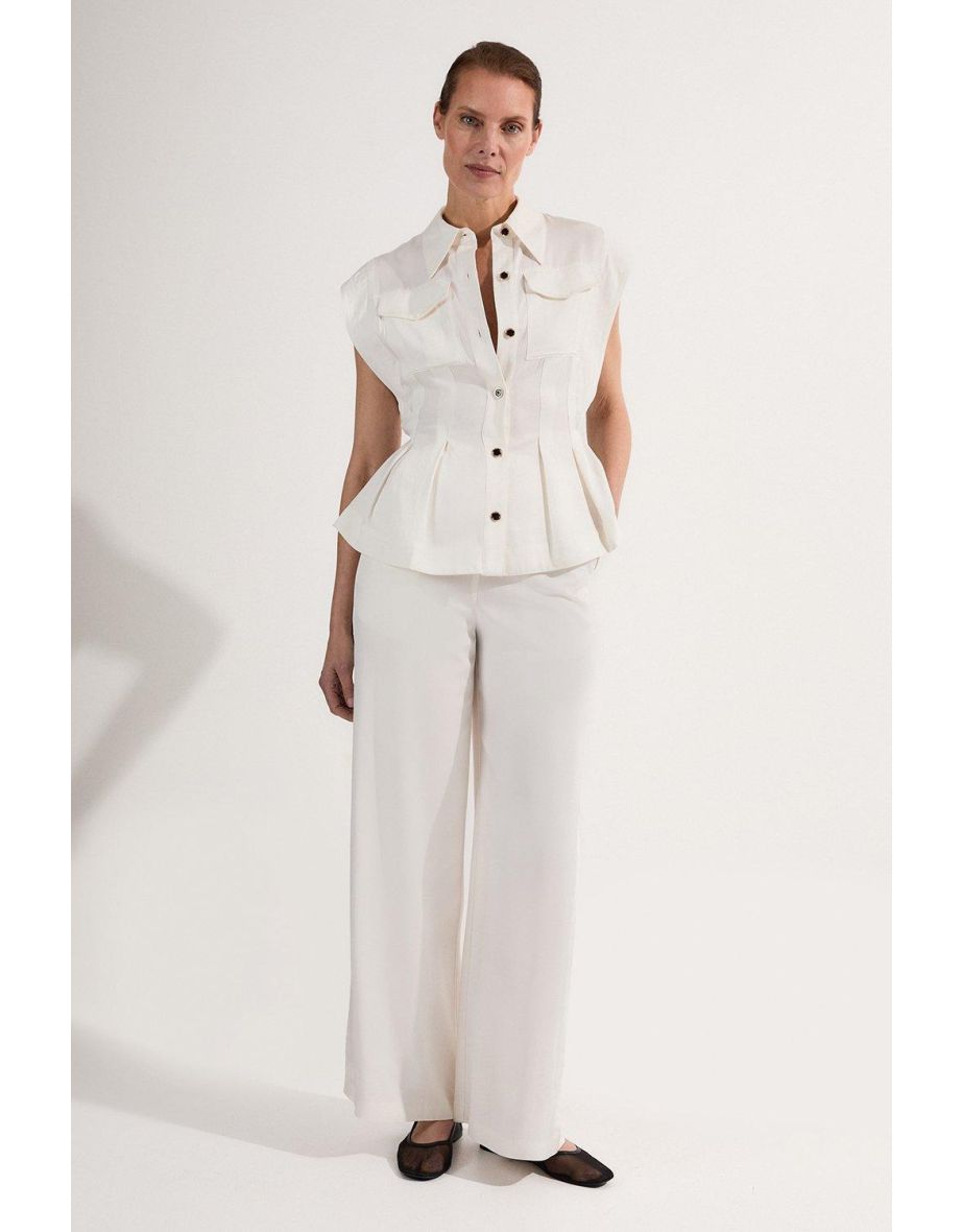 Camicetta alta in lino di viscosa premium con impunture e cuciture in vita