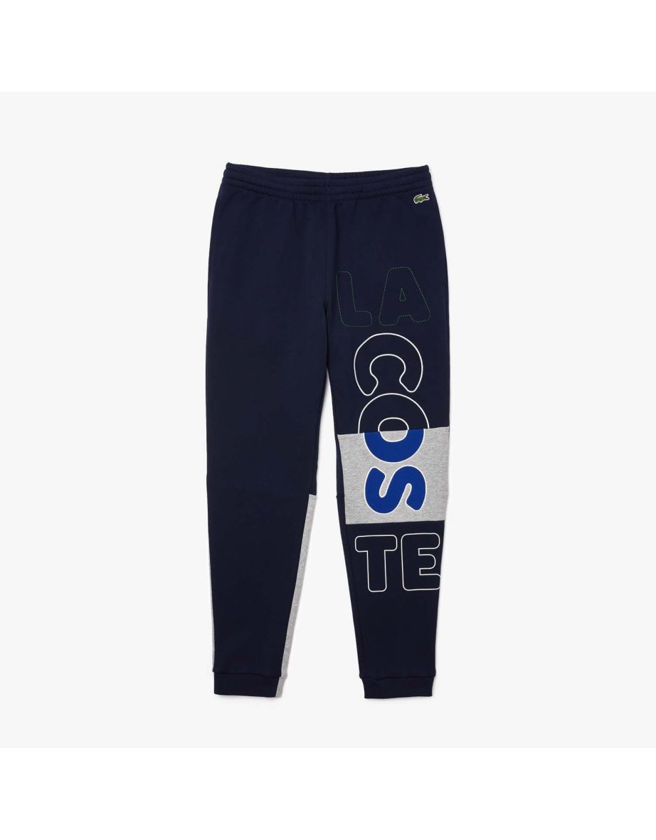 Joggers Lacoste Heritage Distressed Branding in cotone e pile da uomo in blu