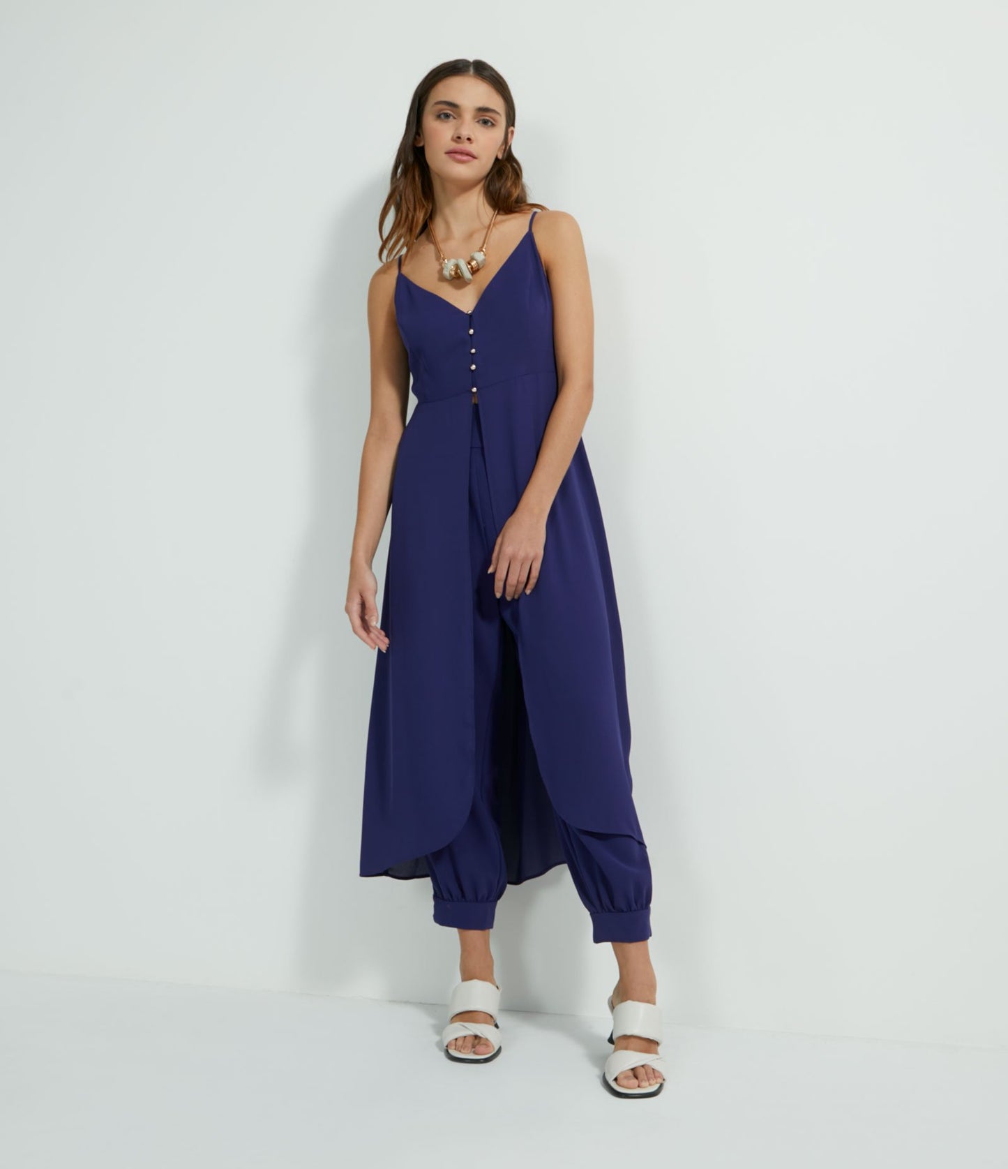 Blusa larga de gasa con botones metálicos en azul