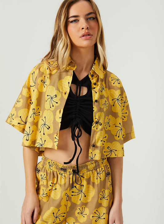 Camicia cropped a macchie floreali