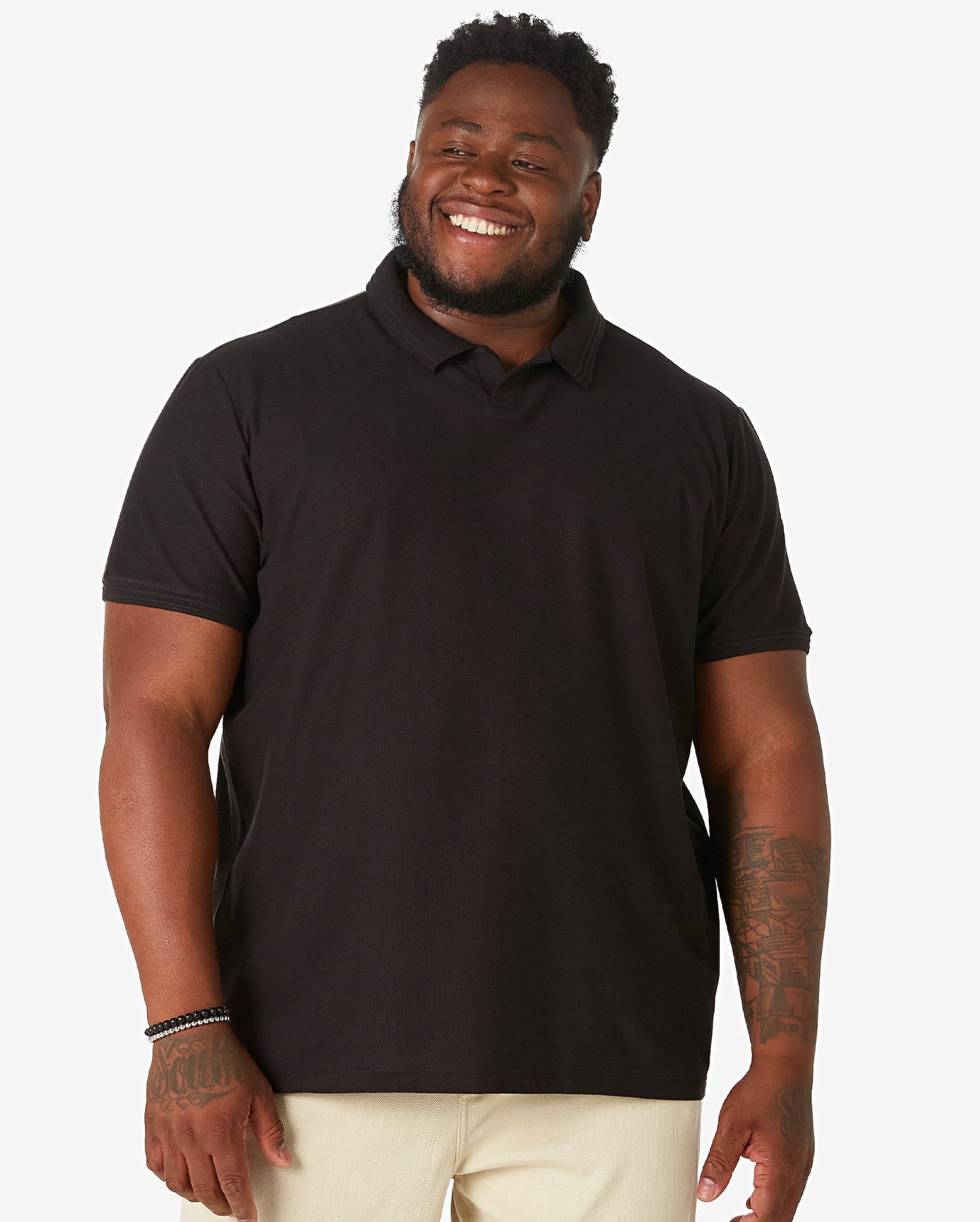 Polo nera plus size da uomo con bottoni - Allman by Riachuelo