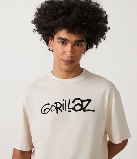 Camiseta Beige Relaxed Fit com estampa de Gorillaz e personagens