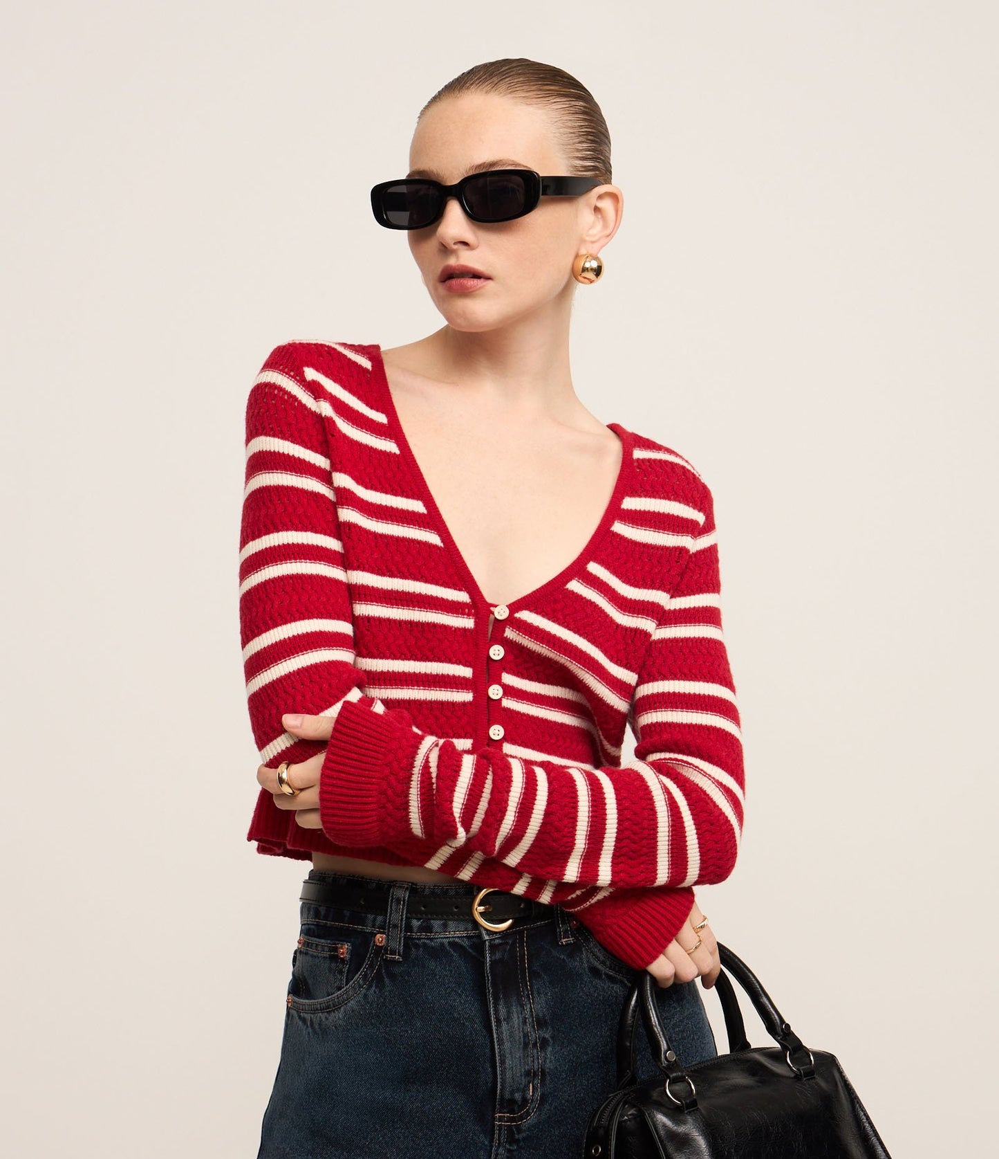 Cardigan in maglia a righe con scollo a V in rosso e bianco